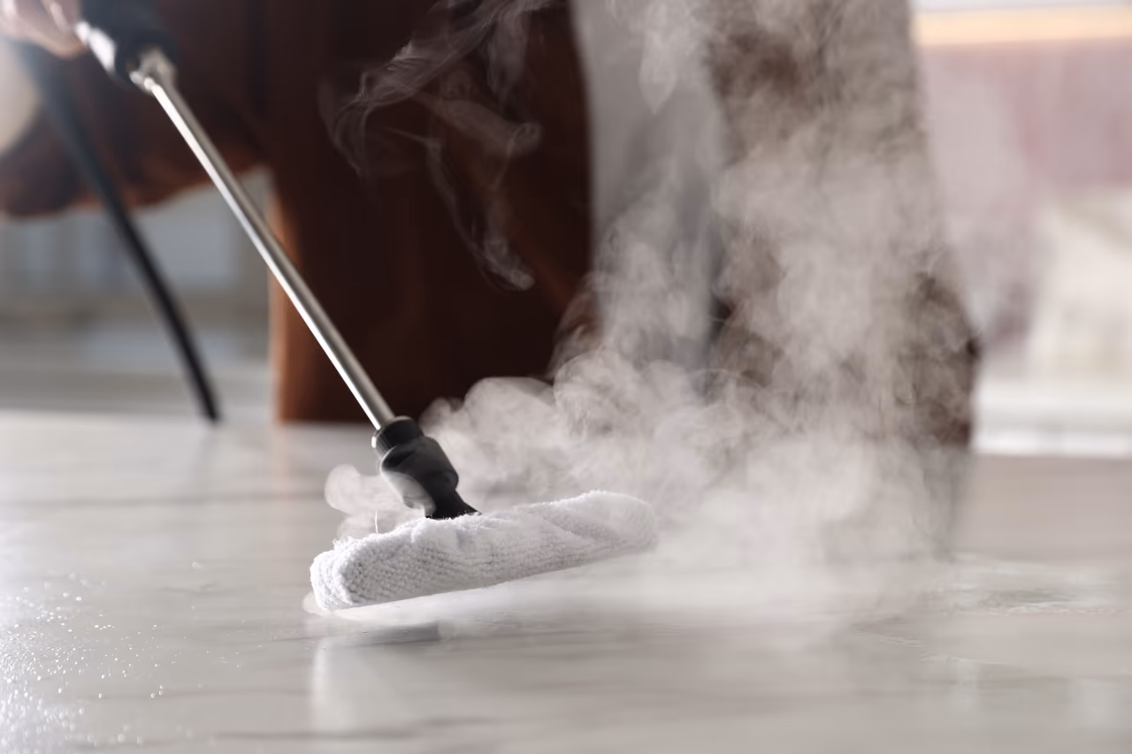 A plush rug being professionally cleaned